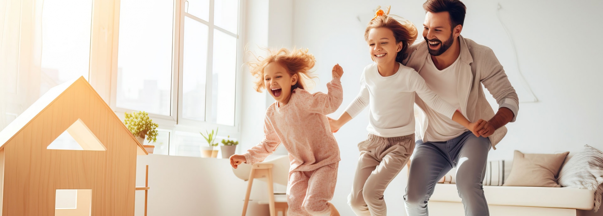 Een vader speelt met zijn kinderen in huis